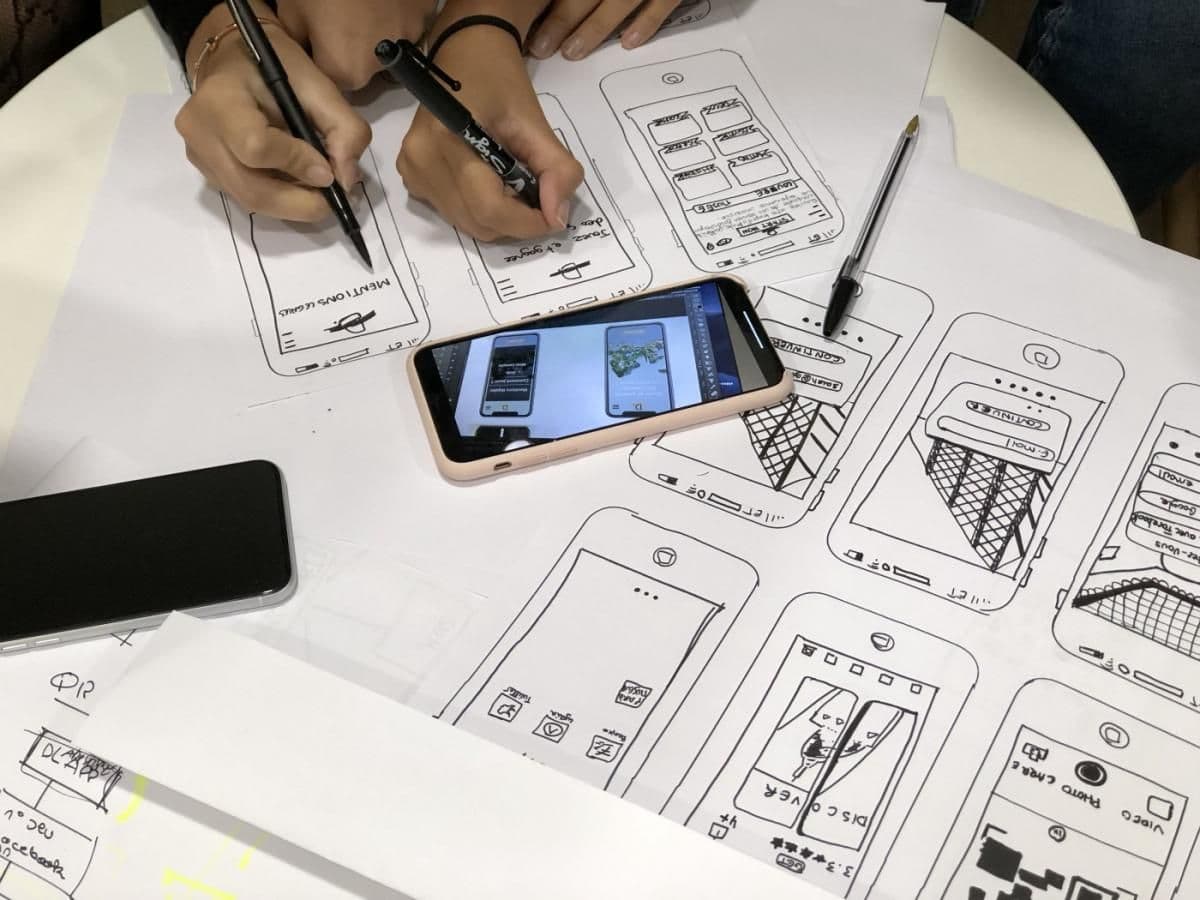 Designers sketching an interface